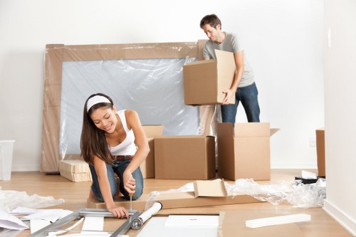 Planning a home move in Woolwich with boxes and local streets in view
