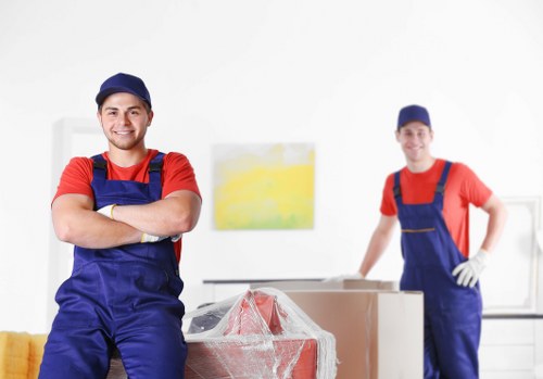 Professional office relocation team planning a business move in Woolwich