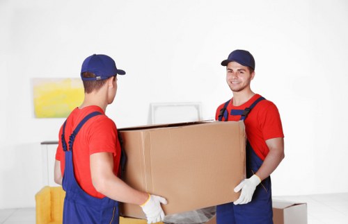 Packed boxes and furniture prepared for student removals in Woolwich