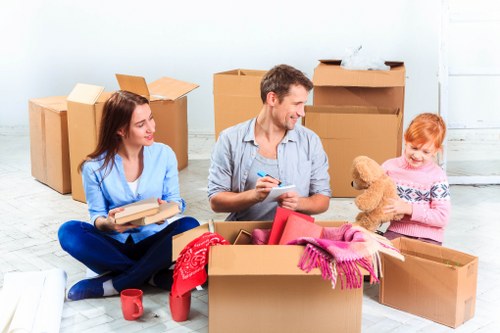 Furniture removals team handling a home move in Woolwich