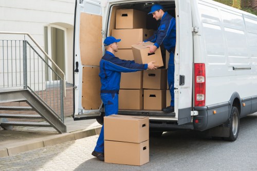 Professional man and van transport near Woolwich town centre