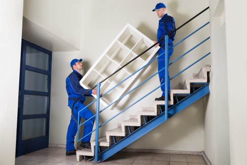 Careful manual handling of furniture during a removal job