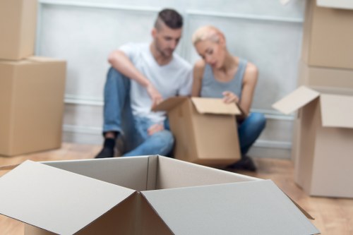 Assorted moving boxes and wrapping materials for fragile items