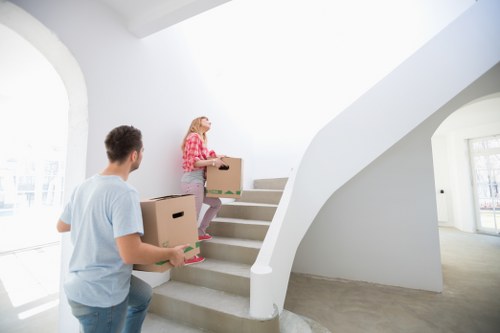 Family organising moving day tasks in Woolwich