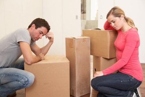 Removal team managing building access for flat removals in Woolwich