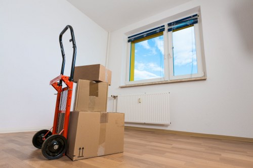 Packed boxes and furniture secured in a removal truck