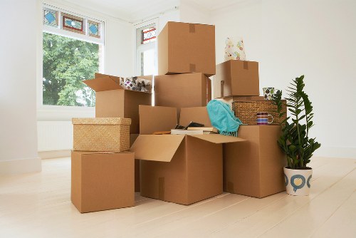 Moving day setup with boxes and equipment for house removal services in Woolwich