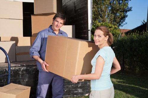 Professional student moving service handling belongings in Woolwich