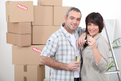 Furniture dismantling and protective wrapping during Woolwich removals